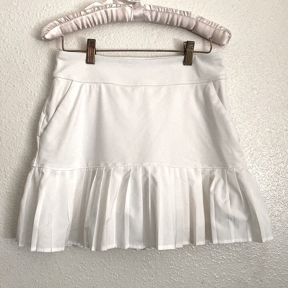 Under Armour Dresses & Skirts - Under Armour • White Tuck Pleated Golf Skirt 🤍
